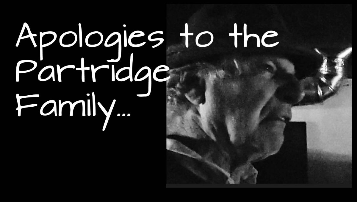 A creepy image of the author imitating film noir behind the words "Apologies to the Partridge Family," by John D Reinhart